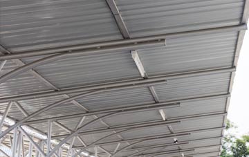 installing Lew metal roofing